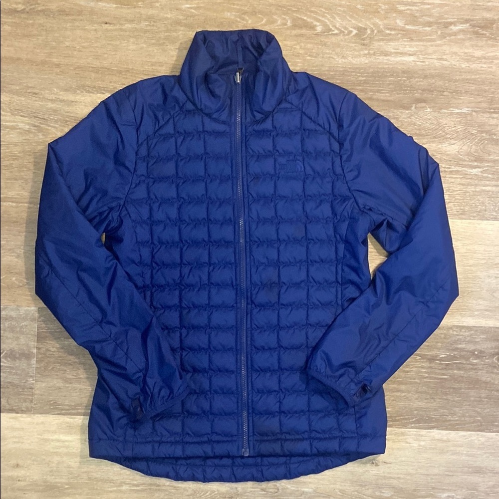 The North Face womens medium blue zip up jacket